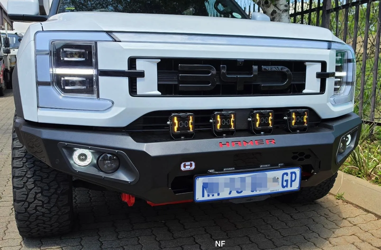 BYD Shark fitted with a HAMER AFRICA King series front bumper and 2 sets of Ruby 5" led spotlights.